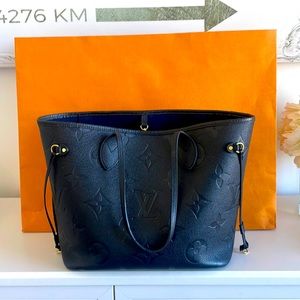 Louis Vuitton MM Monogram Empreinte leather Black with black wristlet and bag